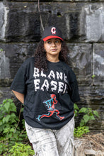 Load image into Gallery viewer, Blank Easel Puff Runner Tee Black (Red &amp; Blue)

